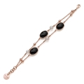 Bracciale con pietre nere e perle